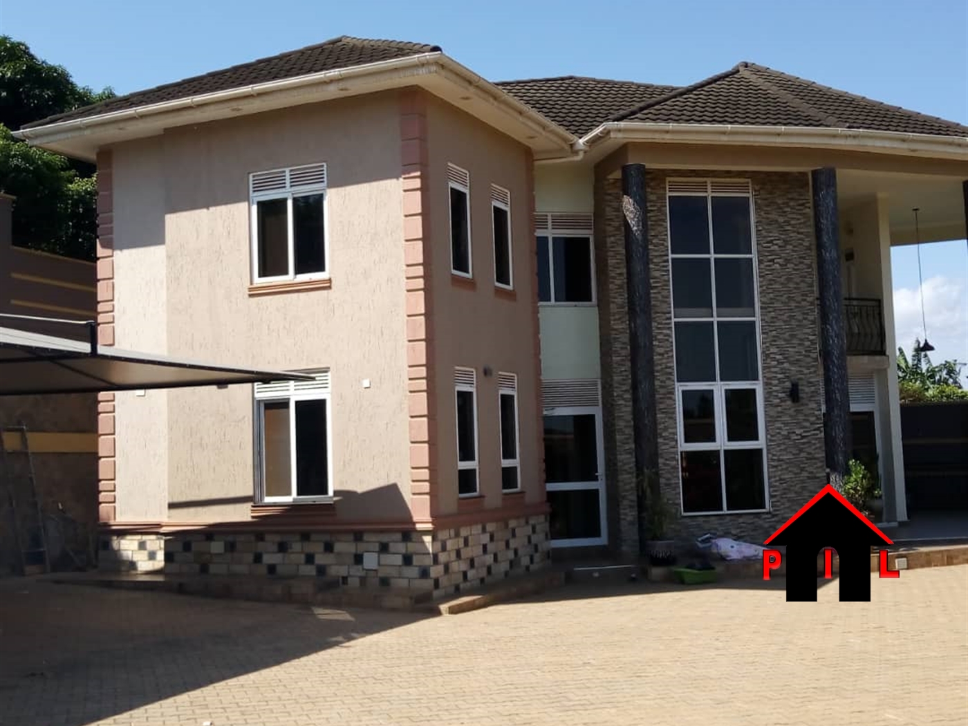 Storeyed house for sale in Kulambilo Kampala